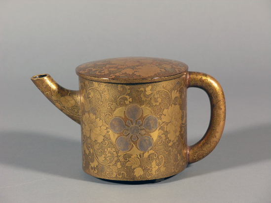 Hearst Museum object titled Pitcher: sake, accession number 9-205a,b, described as Gold lacquer tea pot with cover