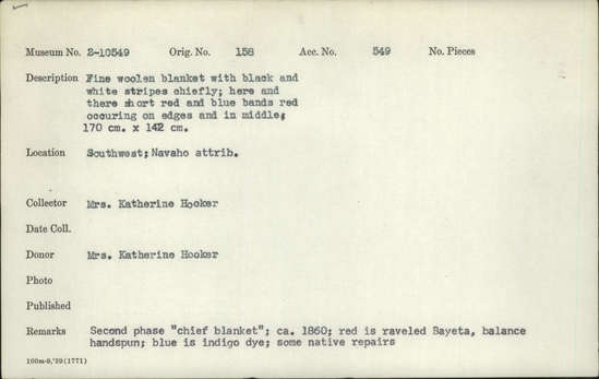 Documentation associated with Hearst Museum object titled Blanket, accession number 2-10549, described as Fine woolen blanket with black and white stripes chiefly; here and there are short red and blue bands, red occuring on edges and in middle. Second phase "chief blanket." Red is raveled Bayeta, balance handspun; blue is indigo dye; some native repairs.