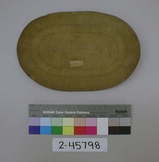 Hearst Museum object titled Place mat, accession number 2-45798, described as Twined basketry; oval placemat. w. 26 cm