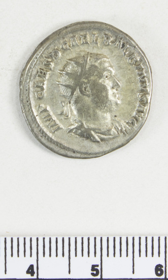 Hearst Museum object 8 of 8 titled Coin: æ denarius, accession number 8-6171, described as Coin: Denarius; Æ (AR?); Balbinus - 5.50 grams. Obverse: IMP CAES D CAEL BALBINVS AVG - Bust facing right, radiate, draped. Reverse: CONCORDIA AVGG  - Clasped hands.