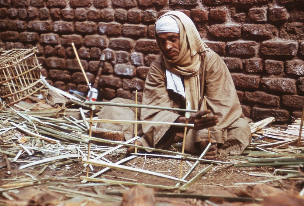 Hearst Museum object titled Color slide, accession number 25-29237, described as 35mm color slide transparency. Wood-working; crate-maker at Luxor.