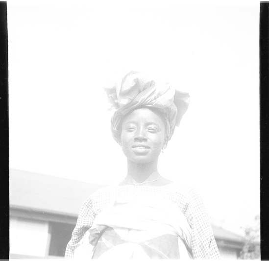 Hearst Museum object titled Black-and-white negative, accession number 15-30826, described as Black and white negative, 2.25'' Nigeria, Meko, "Gele" - Head ties, demonstrated by Mrs. Moronkeji