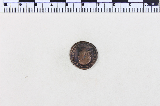 Hearst Museum object titled Coin: æ 3, accession number 8-7239, described as Coin AE 3 Reverse: 2 Standards between 2 soldiers