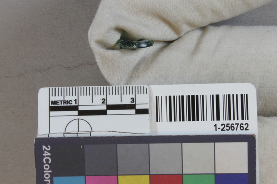 Hearst Museum object titled Glass fragment, accession number 1-256762, described as small piece aqua glass