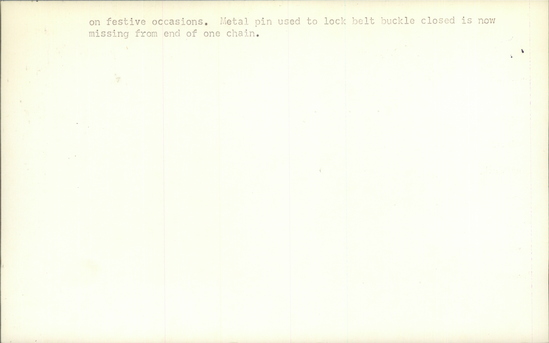 Documentation associated with Hearst Museum object titled Metal belt buckle, accession number 7-5180a,b, described as Woman's metal belt buckle (pafti); silver; stamped designs; "gilded" metal overlay on right and left sides and in middle; 9 pendant chains with discs; 30.5 cm wide