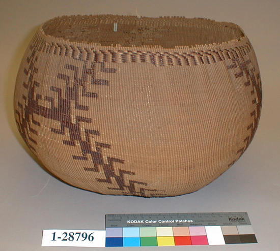 Hearst Museum object titled Basket, accession number 1-28796, described as Twined. Brown overlay design with angular arms.