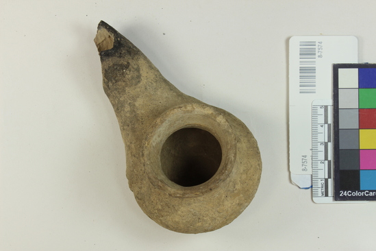 Hearst Museum object titled Oil lamp, accession number 8-7574, described as Oil lamp; round carinated body with flare lip; projecting spout burned and broken