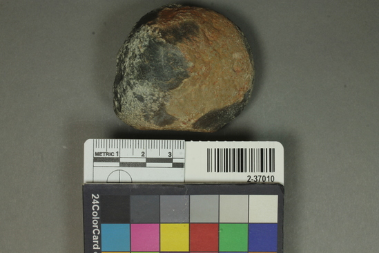 Hearst Museum object titled Hammerstone, accession number 2-37010, described as Rounded basalt hammerstone; much used and worn