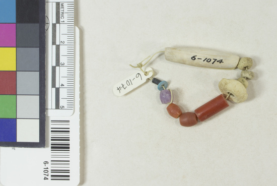 Hearst Museum object 2 of 2 titled Beads, accession number 6-1074, described as Beads: 3 carnelian barrel-shaped 1 cylindrical. 5 shell; 1 slate, 1 amethyst