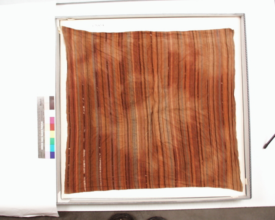 Hearst Museum object titled Cloth w/ coca, accession number 4-5001a, described as Striped cloth ca. 2 feet square; red, blue, and brown colors containing b) coco leaves