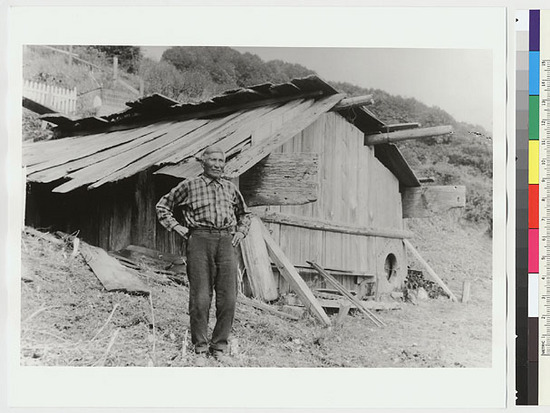 Hearst Museum object titled Black-and-white negative, accession number 15-11491, described as Billy Brooks in front of his house