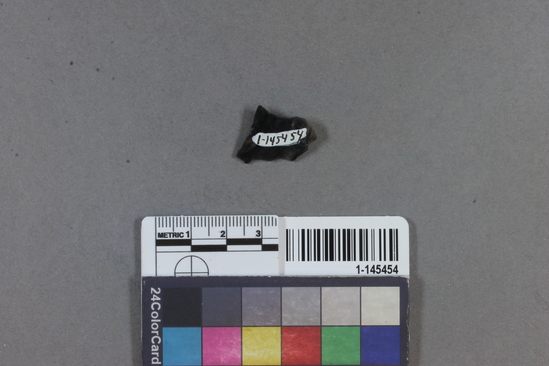 Hearst Museum object titled Flake scraper, accession number 1-145454, described as Flake scraper, obsidian.