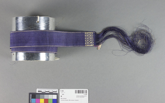 Hearst Museum object 3 of 3 titled Belt, accession number 11-208, described as Belt or ribbon of fiber, violet.