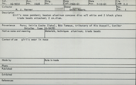 Documentation associated with Hearst Museum object titled Pendant, accession number 16-9531, described as Girl's nose pendant; beaten aluminum concave disc with 2 white and 2 black glass trade beads attached; 2 cm diameter.