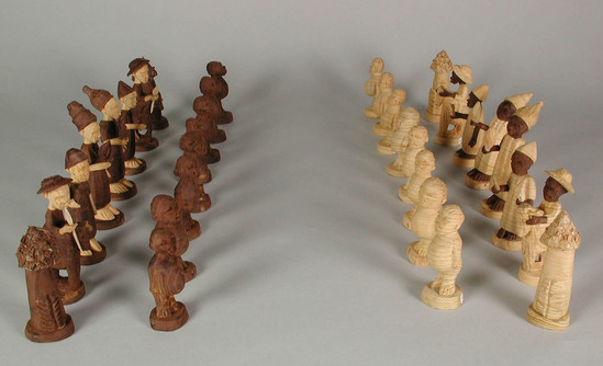 Hearst Museum object titled Chess set, accession number 5-14256a-ff, described as chess set, thorn carvings;  "Black":  (a) king, (b) queen, (c, d) bishops, (e, f) knights, (g, h) castles, (i-p) pawns;  "White":  (q) king, (r) queen, (s, t) bishops, (u, v) knights, (w, x) castles, (y, z, aa-ff) pawns;  h. 4.8 - 8 cm. each.