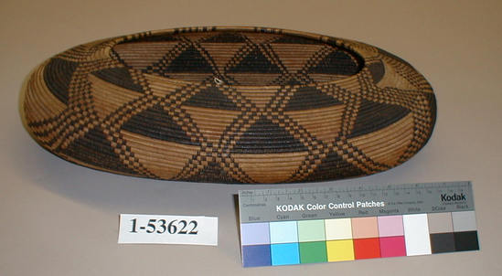 Hearst Museum object titled Canoe shaped basket, accession number 1-53622, described as Coiled basket. Canoe shape. Black design. 35 stitches to the inch.