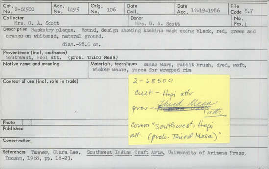 Documentation associated with Hearst Museum object titled Plaque, accession number 2-68500, described as Round, design showing kachina mask using black, red, green and orange on whitened, natural ground. Wicker weave, sumac warp, dyed rabbit brush weft, yucca for wrapped rim.