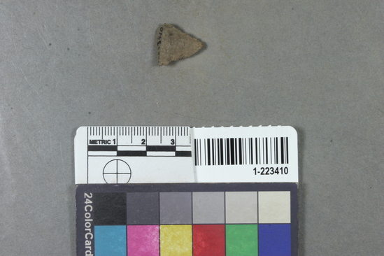 Hearst Museum object titled Projectile point, accession number 1-223410, described as Basalt point fragment