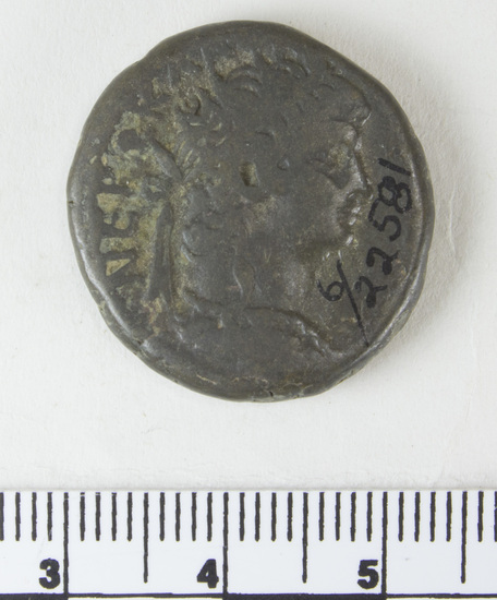 Hearst Museum object 5 of 6 titled Coin: billon tetradrachm, accession number 6-22581, described as bust of Nero, radiate, wearing aegis