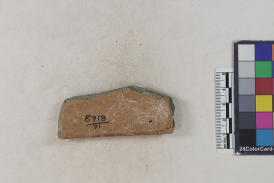 Hearst Museum object 2 of 2 titled Potsherd, accession number 16-8169, described as Potsherd; rim, painted red on rim Section of Manta on beach currently inhabited. Numbers  8111 to 8194 are sherds picked up on beach at low tide.