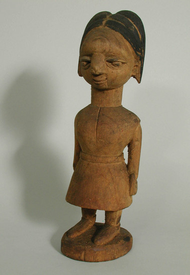 Hearst Museum object titled Figurine, accession number 5-5973, described as wood figurine;  school girl;  black paint on hair;  H. 21 1/4