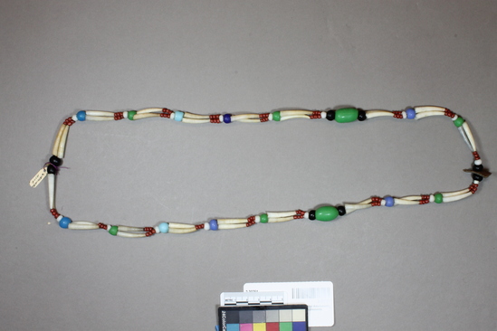 Hearst Museum object titled Necklace, accession number 2-39751, described as Made of glass trade beads and dentalium shells, one piece of Haliotis rufescens.