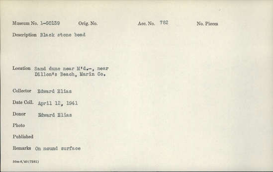 Documentation associated with Hearst Museum object titled Bead, accession number 1-60139, described as Black stone. Notice: Image restricted due to its potentially sensitive nature. Contact Museum to request access.