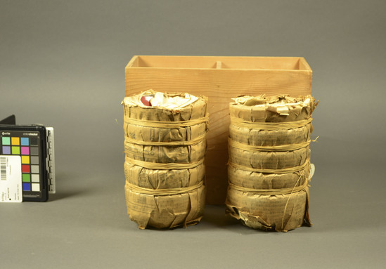 Hearst Museum object titled Bowl and lid, accession number 9-17744a-c, described as Bowls with lids; (10) 2 packages each of five conical, lacquered bowls and lids in original packing of straw and newspaper in original wood shipping crate.  The bowls are vermillion inside, black outside.  Newspaper packing is dated Taisho Period April 3, 1914.  A) shipping crate 29cm by 15 cm by 22 cm.  B) 1st package of bowls 19 cm by 12 cm by 12 cm.  C) 2nd package of bowls 19 cm by 12 cm by 12 cm.  Each bowl ht. 5.5 cm, diam 11 cm.