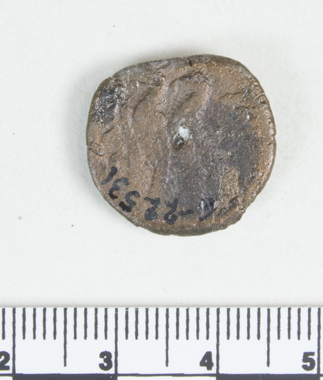 Hearst Museum object titled Coin: æ, accession number 6-22531, described as Diademed head of Zeus Ammon, r. central hole