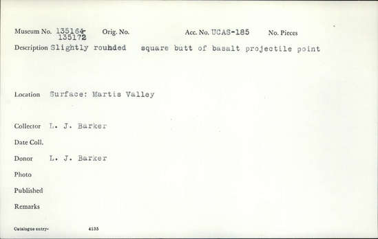 Documentation associated with Hearst Museum object titled Projectile point butt, accession number 1-135167, described as Slightly rounded, square butt of basalt projectile point.