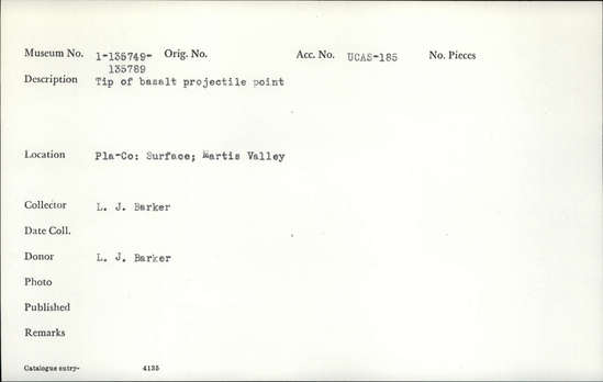 Documentation associated with Hearst Museum object titled Projectile point, accession number 1-135754, described as Tip of basalt projectile point.