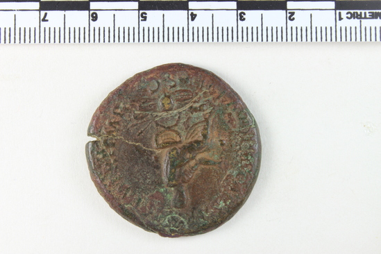 Hearst Museum object 8 of 8 titled Coin: ar, accession number 8-4732, described as Coin; AR; Roman. Claudius, 41-54 AD. Obverse: NERO CLAVDIVS DRVSVS GERMANICVS, bust r. laureate. Reverse: TI CLAVDIVS CAESAR TR P IMP, figure seated l.