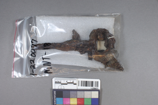 Hearst Museum object titled Key, accession number 1-220077, described as Iron. Multiple fragments of unanalyzed key remains made up of metal.