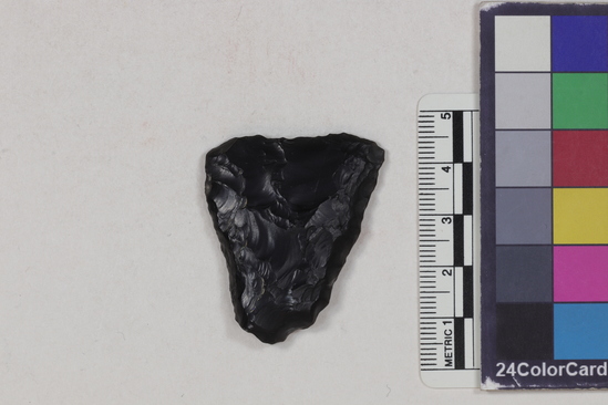 Hearst Museum object titled Projectile point fragment, accession number 16-14355, described as Projectile point fragment; obsidian; triangular; weight: 10.35 grams; length: 4.06 cm; width: 3.47 cm; depth: 0.74 cm; convex sides; slight concave base, thinned base.