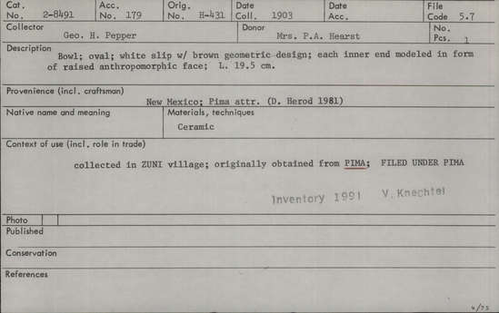 Documentation associated with Hearst Museum object titled Bowl, accession number 2-8491, described as Bowl; oval, white slip with brown geometric design. Each inner end modeled in form of raised anthropomorphic face. Ceramic. Width 19.5 cm.