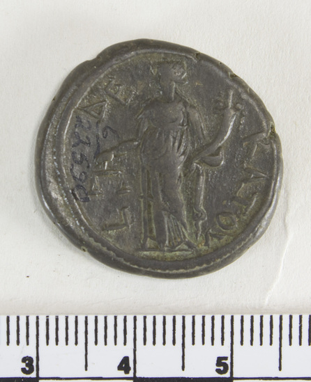 Hearst Museum object 6 of 6 titled Coin: billon tetradrachm, accession number 6-22590, described as obverse: head of Hadrian, right. laureate, wearing cloak and cuirass reverse: dikaioeyne standing left