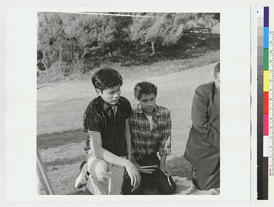 Hearst Museum object titled Black-and-white negative, accession number 15-19494, described as Indian boys and Sidney Parrish playing stick game