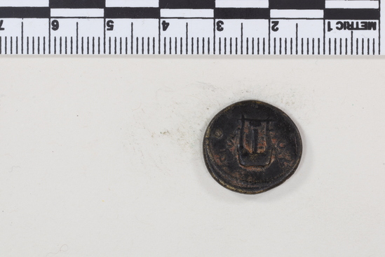 Hearst Museum object 3 of 14 titled Coin: æ semis, accession number 8-8133, described as Coin; Æ; aes grave; semis; Orichalcum. 3.751 grams. Obverse: Head of Hadrian, facing right. Reverse: S C flanking object.