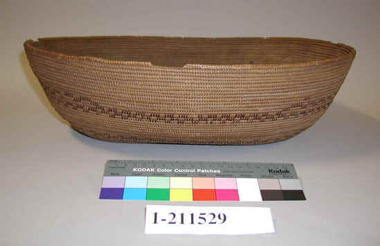 Hearst Museum object titled Basket, accession number 1-211529, described as Coiled; oval-shaped with flaring sides.  Rim damaged in several places.  Design: 2 horizontal bands of "flying geese" in red; in redbud. 3-rod foundation.