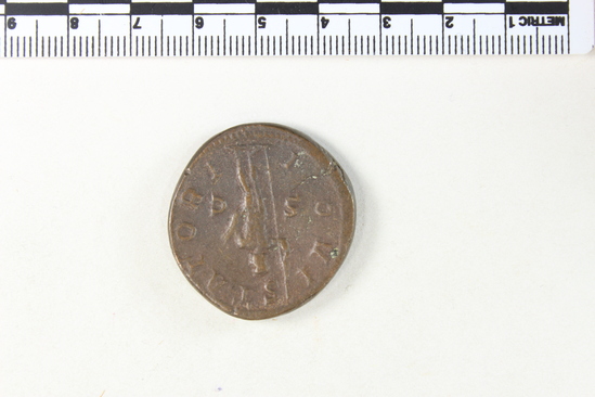 Hearst Museum object 6 of 8 titled Coin: æ sestertius, accession number 8-5924, described as Coin: Sestertius; Æ; Gordianus.Pius - 21.13 grams. Rome, 240-244 AD. Obverse: IMP GORDIANVS PIVS FEL AVG - bust facing right, laureate, draped, cuirassed. Reverse: IOVI STATORI, SC - Jupiter standing facing left, holds long scepter and thunderbolt.