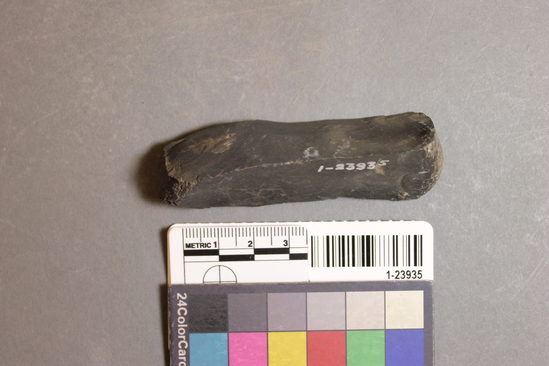 Hearst Museum object titled Slate fragment, accession number 1-23935, described as Triangular in transverse cross section, giving 3 sharp longitudinal edges.