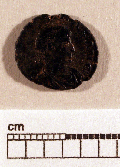 Hearst Museum object titled Coin: æ, accession number 8-8139, described as Coin. Bronze, 14 mm. diameter, 1.225 g. Obverse: Head of Constans, facing right. Reverse: Figure, facing left. Mintmark illegible.