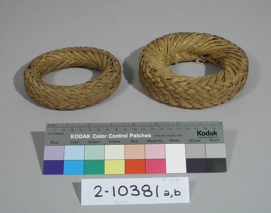 Hearst Museum object titled Rings, accession number 2-10381a,b, described as Plaited rings of yucca fiber.