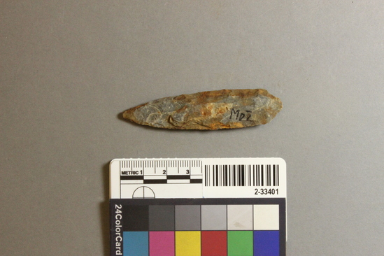 Hearst Museum object titled Projectile point, accession number 2-33401, described as Projectile point; stemmed; base missing; 70 mm long, 18 mm wide.