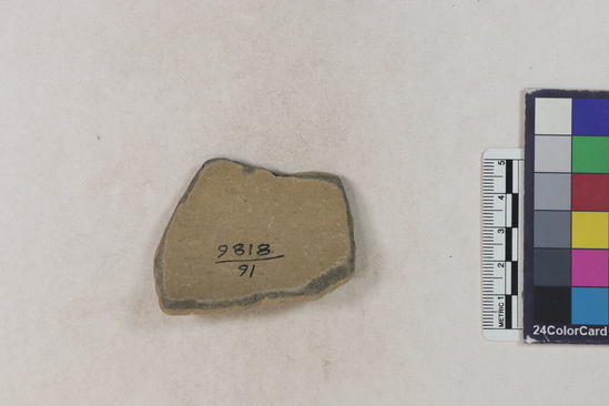 Hearst Museum object titled Potsherd, accession number 16-8186, described as Potsherd: shoulder, yellow and brown slip Section of Manta on beach currently inhabited. Numbers  8111 to 8194 are sherds picked up on beach at low tide.