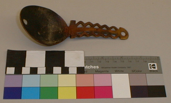 Hearst Museum object titled Spoon, accession number 1-2226, described as Handcarved of elk antler.  Oval bowl.  Handle with dentate edges and open work triangles.