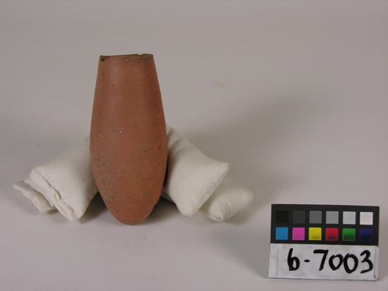 Hearst Museum object titled Beer cup, accession number 6-7003, described as Pottery: deep pointed-bottomed buff, red; least diameter 4 1/2 cm, greatest diameter 7 cm, height 14 cm.