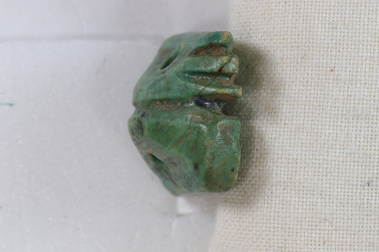 Hearst Museum object 3 of 9 titled Amulet seal, accession number 6-22123, described as Pyramidal amulet-seal; 16x17 mm, of greenish faience