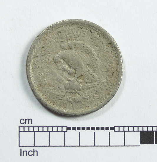 Hearst Museum object titled Coin: silver 5 centavos, accession number 3-22771, described as Coin; Ag 5 centavos Obverse: National Emblem Reverse: indecipherable, no date, worn. Found in city of Sonoma, California.