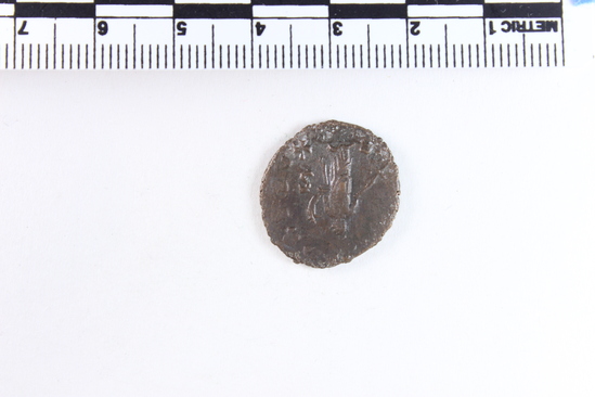 Hearst Museum object 5 of 6 titled Coin: æ, accession number 8-9119, described as Coin; Æ; Roman. Obverse: Bust facing right, diademed. Reverse: Figure standing looking left, draped.